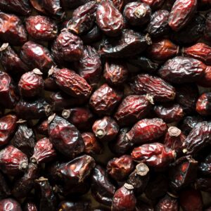 Background of dry rose hips close-up