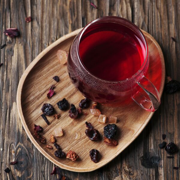 Red hot tea on the wooden table